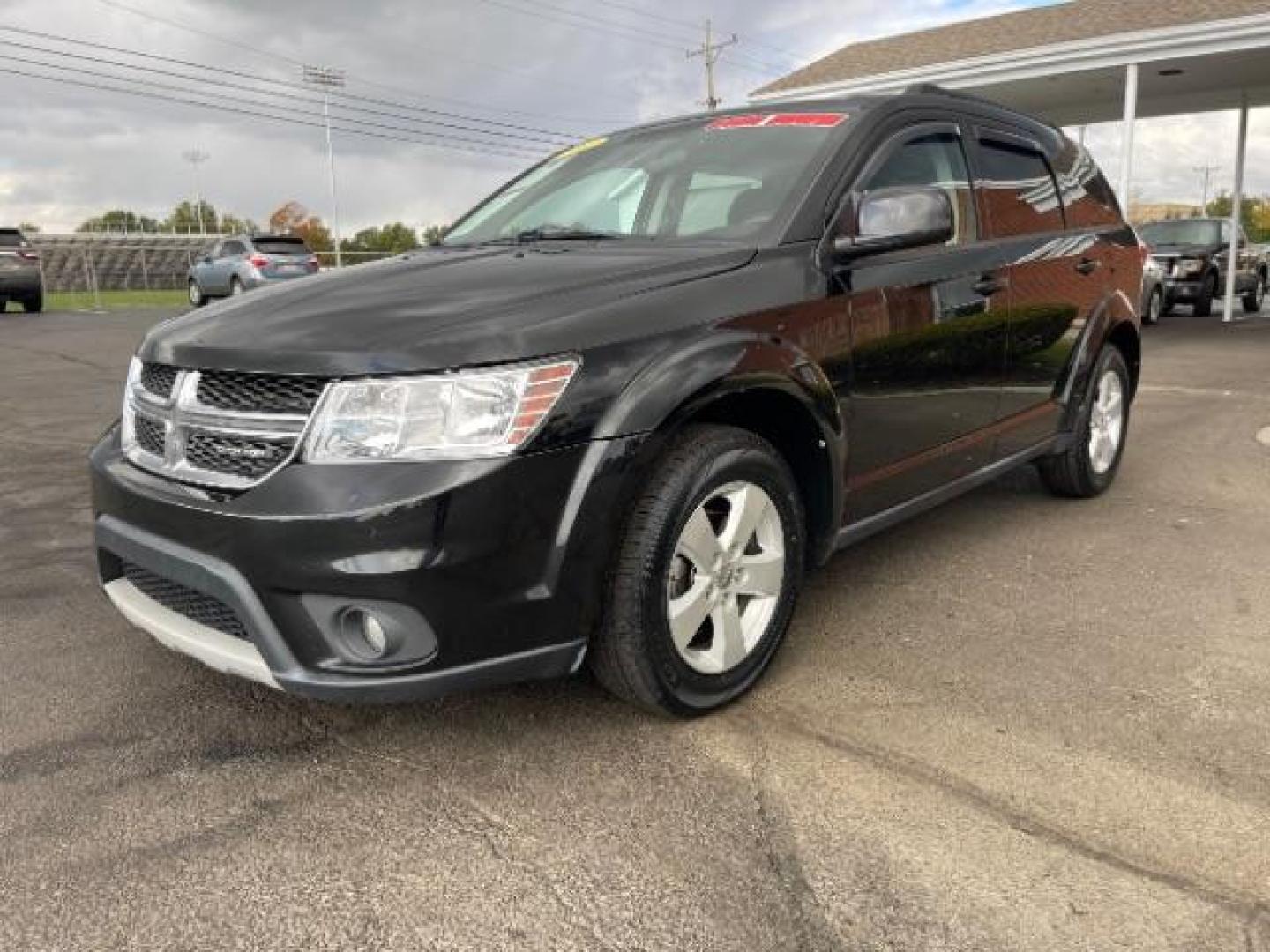 2012 Brilliant Black Crystal Pearl Dodge Journey SXT (3C4PDCBG9CT) with an 3.6L V6 DOHC 24V engine, 6-Speed Automatic transmission, located at 1865 W 2nd St., Xenia, OH, 45385, (937) 372-7777, 39.681259, -83.961945 - Photo#1