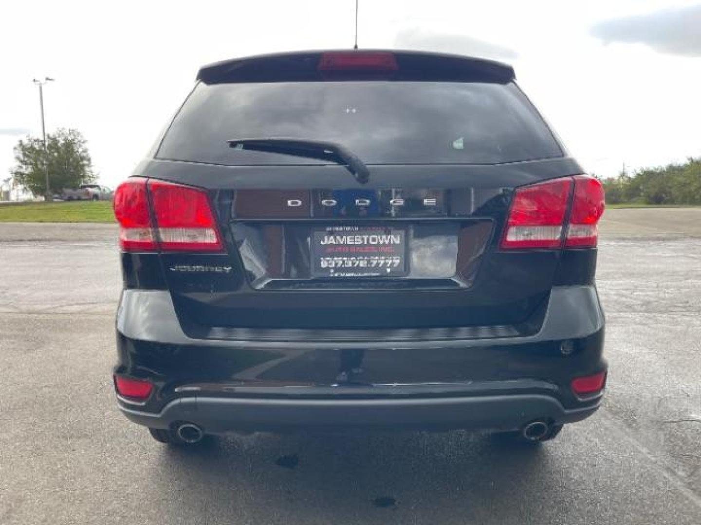 2012 Brilliant Black Crystal Pearl Dodge Journey SXT (3C4PDCBG9CT) with an 3.6L V6 DOHC 24V engine, 6-Speed Automatic transmission, located at 1865 W 2nd St., Xenia, OH, 45385, (937) 372-7777, 39.681259, -83.961945 - Photo#5