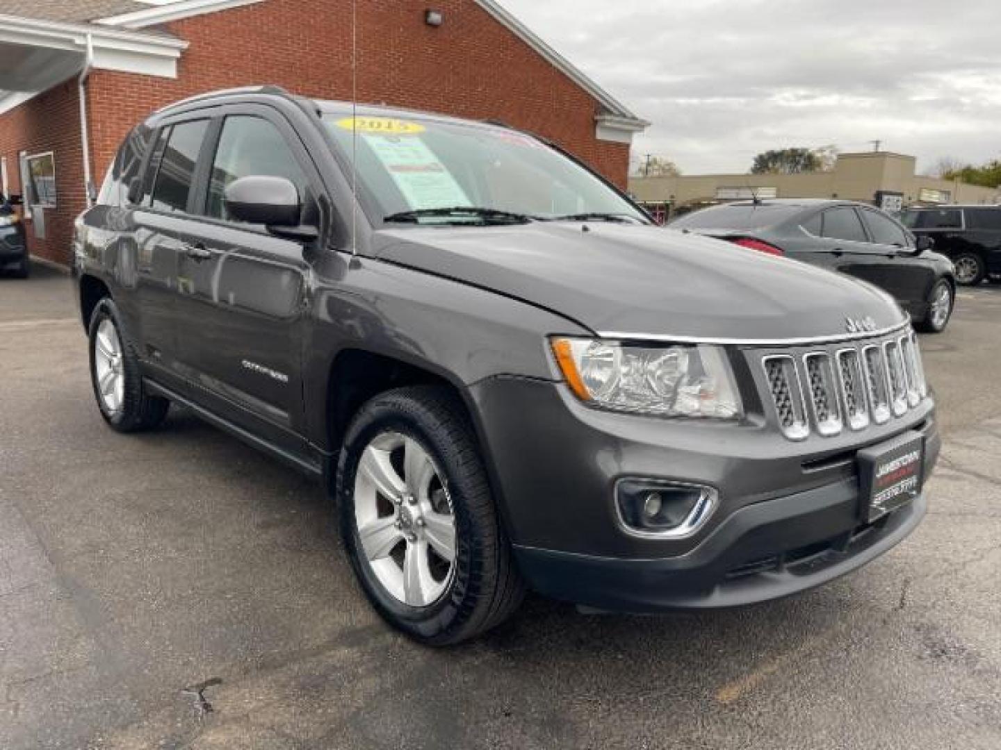 2015 Granite Crystal Metallic Clear Coat Jeep Compass Latitude 4WD (1C4NJDEB3FD) with an 2.4L L4 DOHC 16V engine, 6-Speed Automatic transmission, located at 1865 W 2nd St., Xenia, OH, 45385, (937) 372-7777, 39.681259, -83.961945 - Photo#0