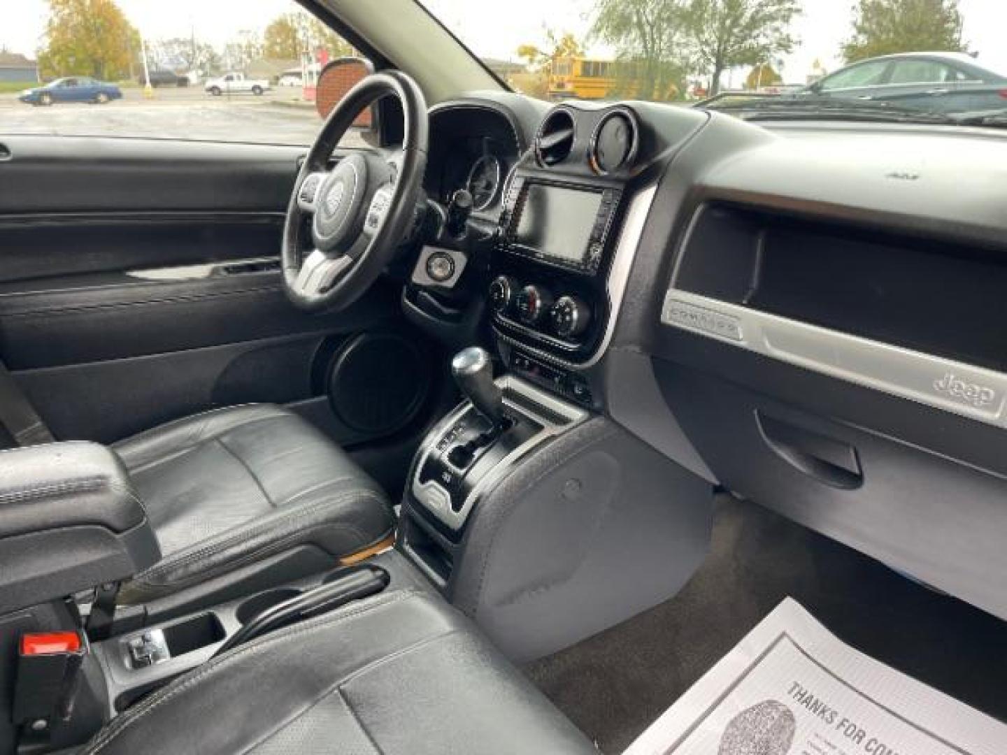 2015 Granite Crystal Metallic Clear Coat Jeep Compass Latitude 4WD (1C4NJDEB3FD) with an 2.4L L4 DOHC 16V engine, 6-Speed Automatic transmission, located at 1865 W 2nd St., Xenia, OH, 45385, (937) 372-7777, 39.681259, -83.961945 - Photo#10