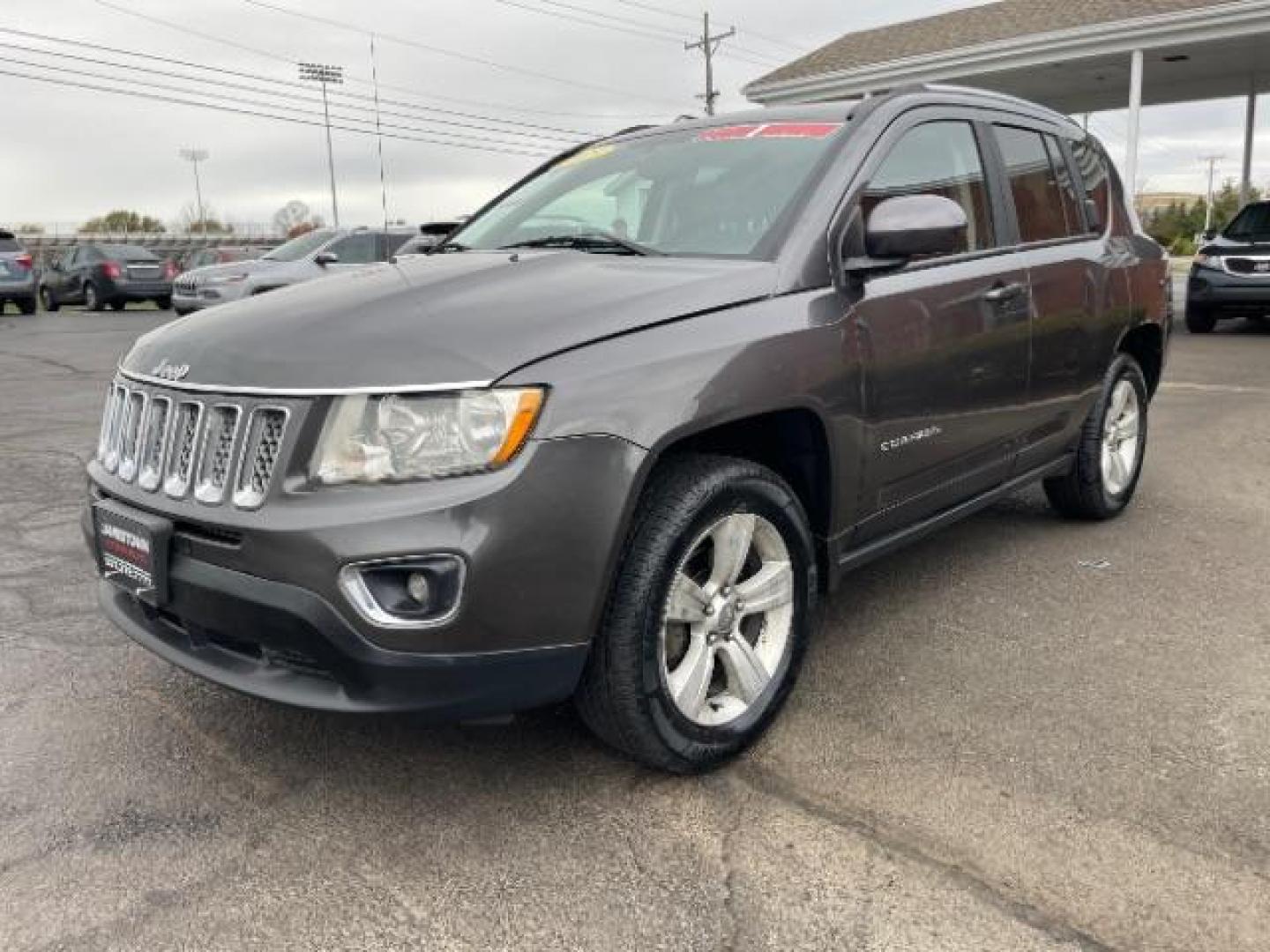 2015 Granite Crystal Metallic Clear Coat Jeep Compass Latitude 4WD (1C4NJDEB3FD) with an 2.4L L4 DOHC 16V engine, 6-Speed Automatic transmission, located at 1865 W 2nd St., Xenia, OH, 45385, (937) 372-7777, 39.681259, -83.961945 - Photo#1