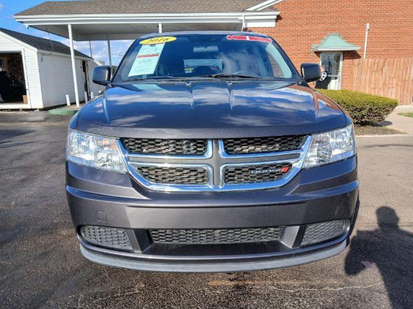 2016 Granite Crystal Metallic Clear Coat Dodge Journey SE (3C4PDCAB7GT) with an 2.4L L4 DOHC 16V engine, 4-Speed Automatic transmission, located at 1865 W 2nd St., Xenia, OH, 45385, (937) 372-7777, 39.681259, -83.961945 - Photo#4