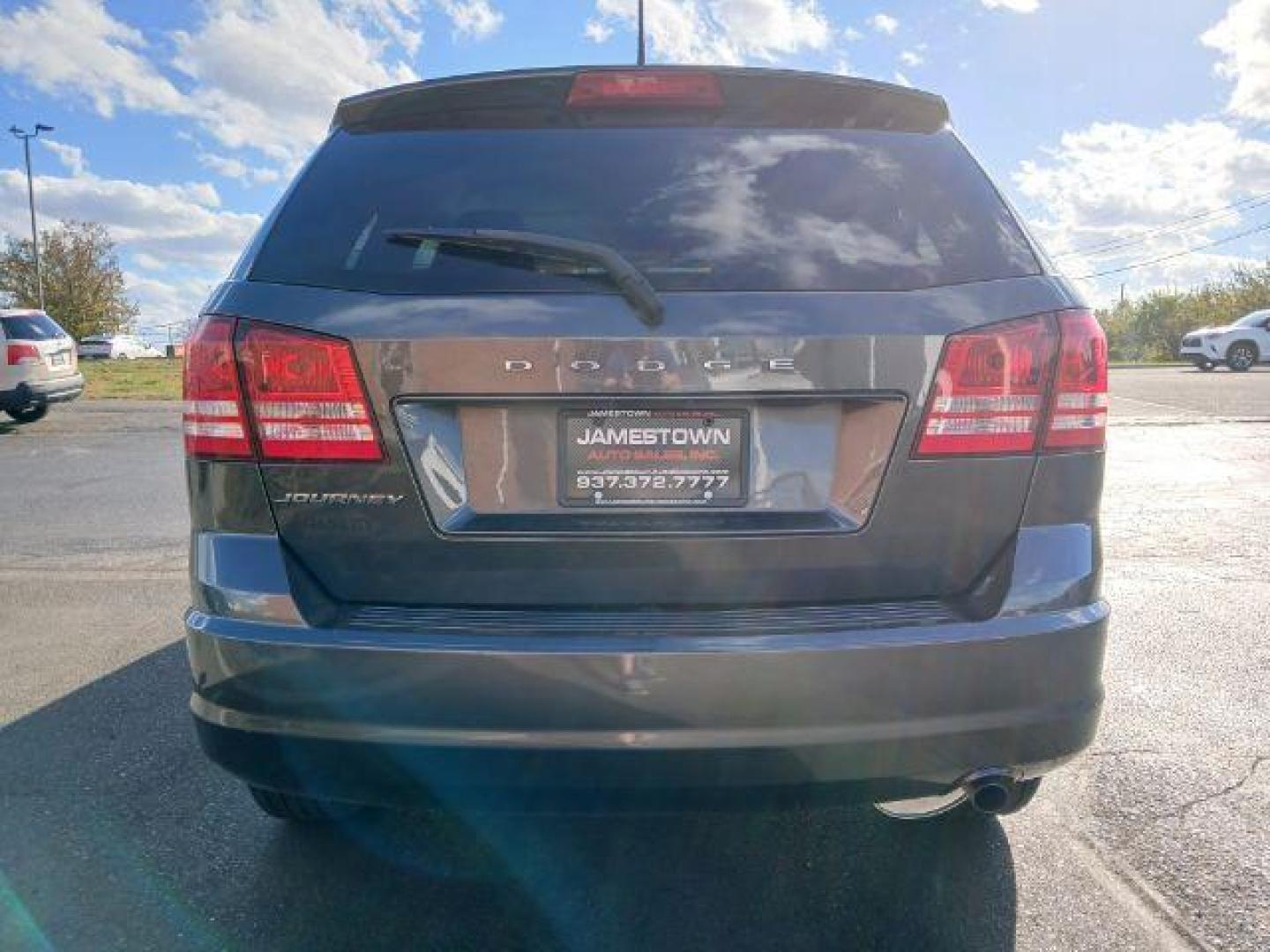 2016 Granite Crystal Metallic Clear Coat Dodge Journey SE (3C4PDCAB7GT) with an 2.4L L4 DOHC 16V engine, 4-Speed Automatic transmission, located at 1865 W 2nd St., Xenia, OH, 45385, (937) 372-7777, 39.681259, -83.961945 - Photo#5