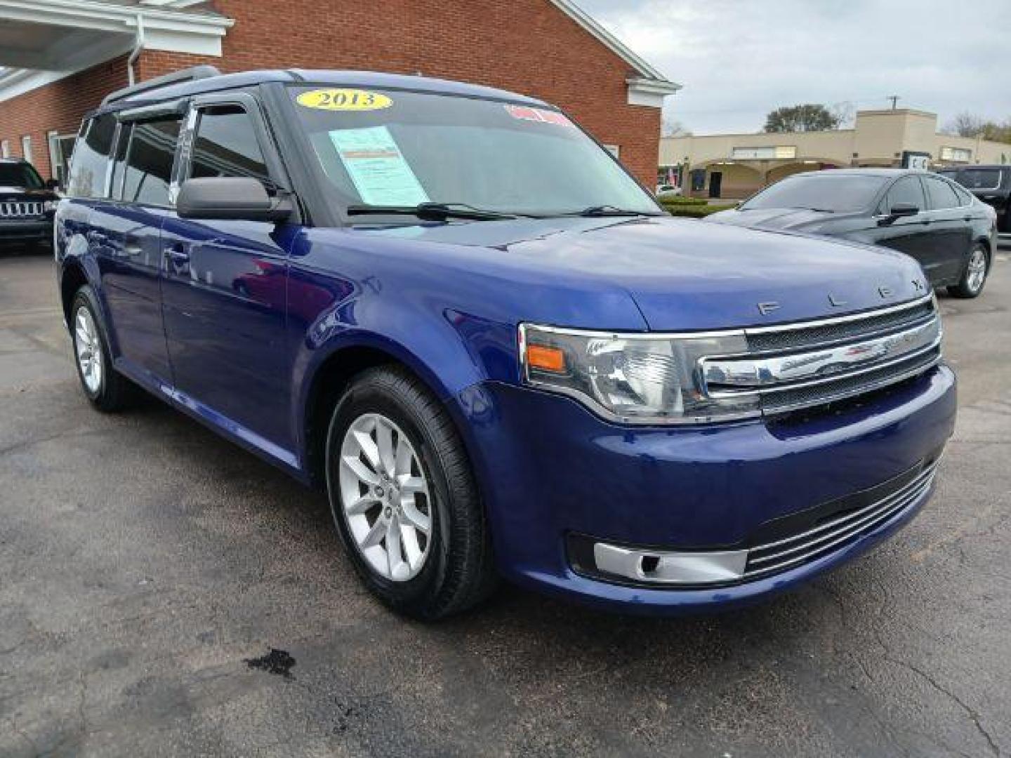 2013 Deep Impact Blue Metallic Ford Flex SE FWD (2FMGK5B8XDB) with an 3.5L V6 DOHC 24V engine, 6-Speed Automatic Overdrive transmission, located at 1865 W 2nd St., Xenia, OH, 45385, (937) 372-7777, 39.681259, -83.961945 - Photo#0