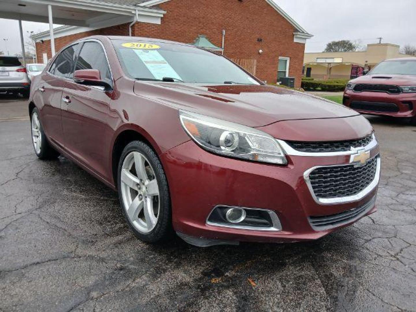 2015 Butte Red Metallic Chevrolet Malibu 2LTZ (1G11G5SX2FF) with an 2.0L L4 DOHC 16V engine, 6-Speed Automatic transmission, located at 1865 W 2nd St., Xenia, OH, 45385, (937) 372-7777, 39.681259, -83.961945 - Photo#0