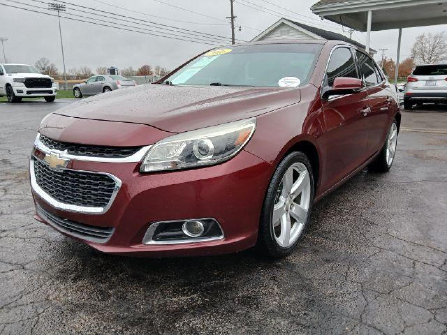 2015 Butte Red Metallic Chevrolet Malibu 2LTZ (1G11G5SX2FF) with an 2.0L L4 DOHC 16V engine, 6-Speed Automatic transmission, located at 1865 W 2nd St., Xenia, OH, 45385, (937) 372-7777, 39.681259, -83.961945 - Photo#1