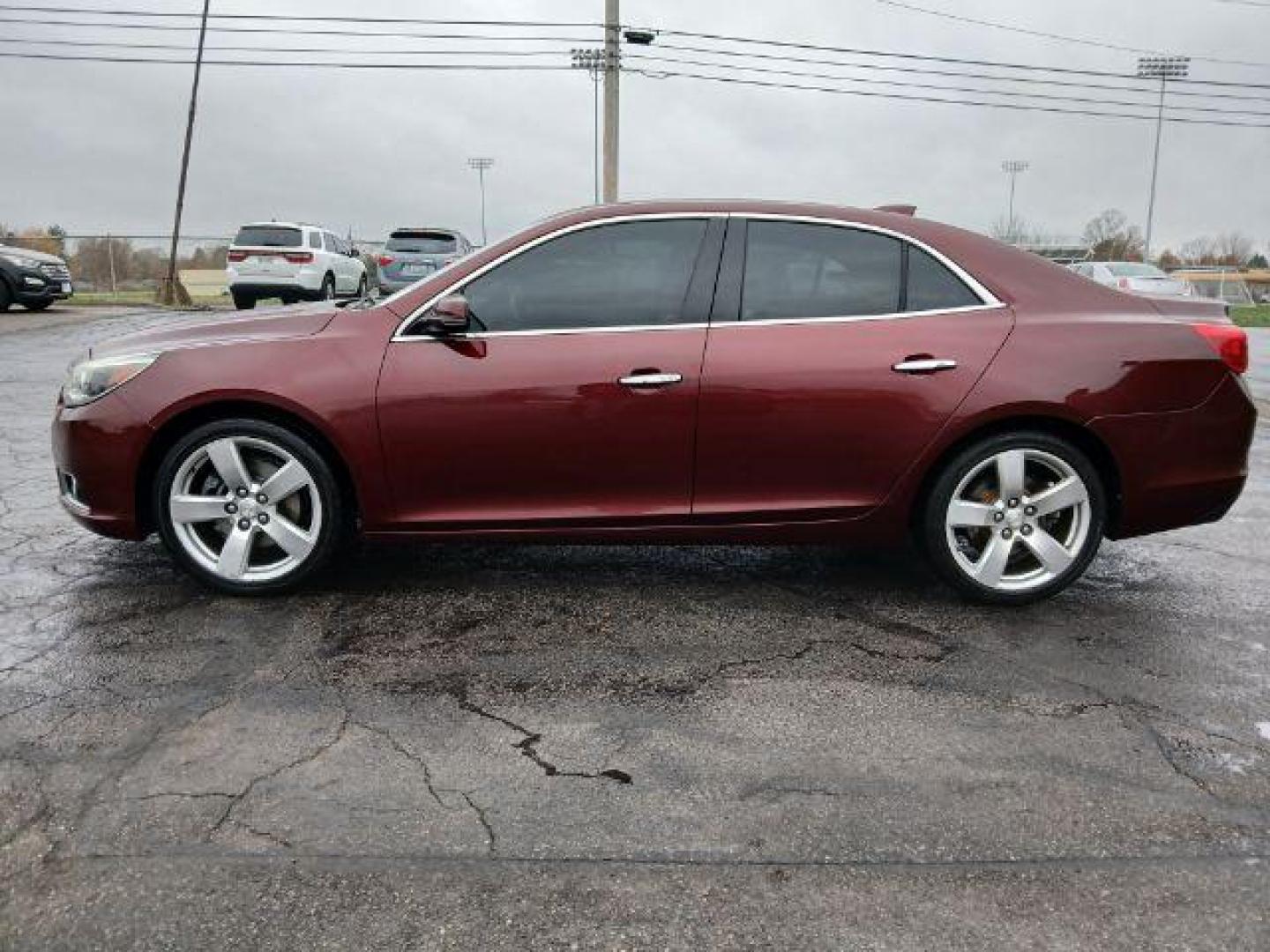 2015 Butte Red Metallic Chevrolet Malibu 2LTZ (1G11G5SX2FF) with an 2.0L L4 DOHC 16V engine, 6-Speed Automatic transmission, located at 1865 W 2nd St., Xenia, OH, 45385, (937) 372-7777, 39.681259, -83.961945 - Photo#2