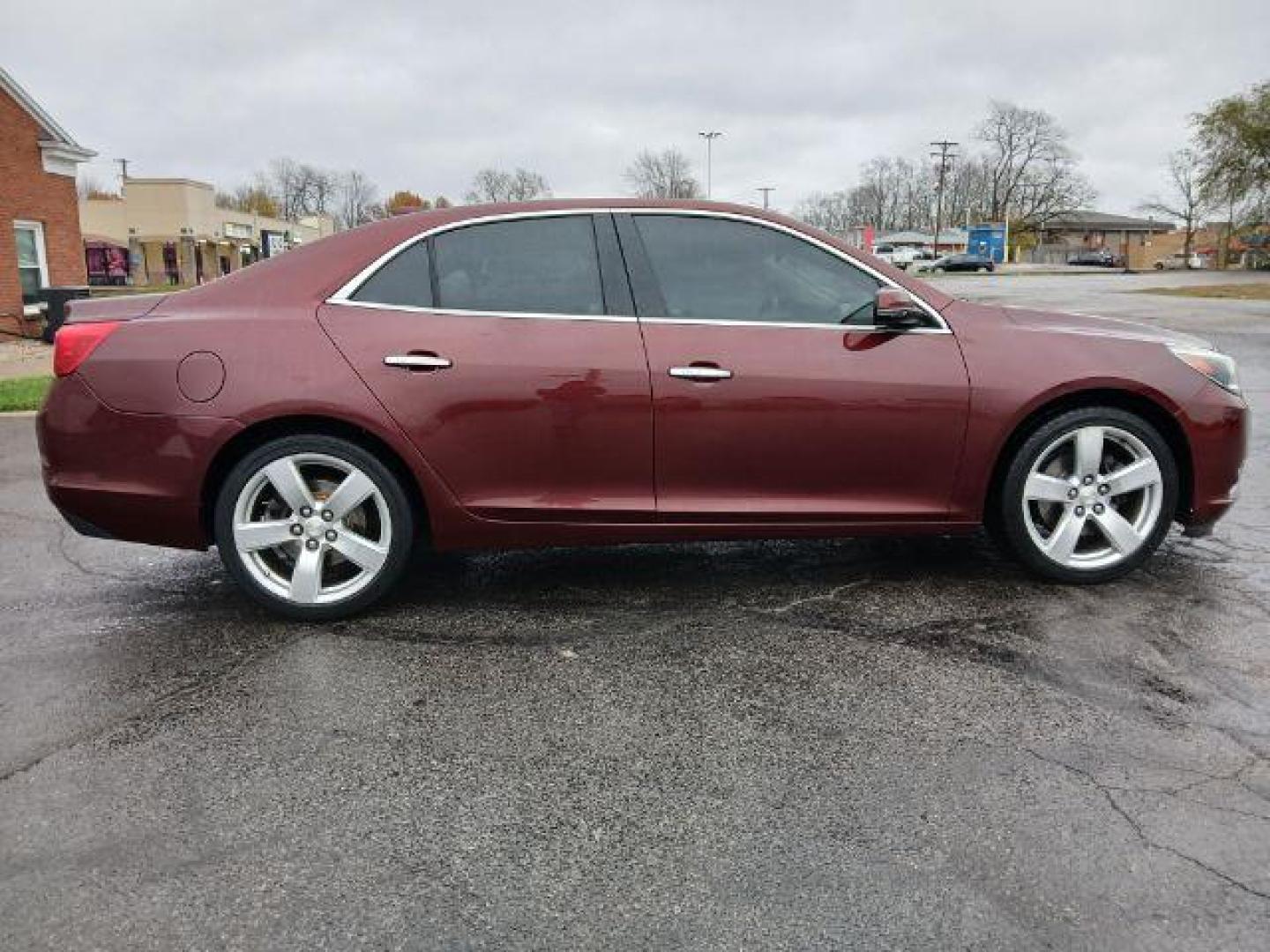 2015 Butte Red Metallic Chevrolet Malibu 2LTZ (1G11G5SX2FF) with an 2.0L L4 DOHC 16V engine, 6-Speed Automatic transmission, located at 1865 W 2nd St., Xenia, OH, 45385, (937) 372-7777, 39.681259, -83.961945 - Photo#3