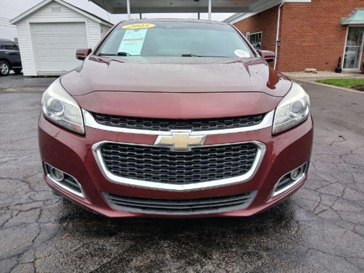 2015 Butte Red Metallic Chevrolet Malibu 2LTZ (1G11G5SX2FF) with an 2.0L L4 DOHC 16V engine, 6-Speed Automatic transmission, located at 1865 W 2nd St., Xenia, OH, 45385, (937) 372-7777, 39.681259, -83.961945 - Photo#4