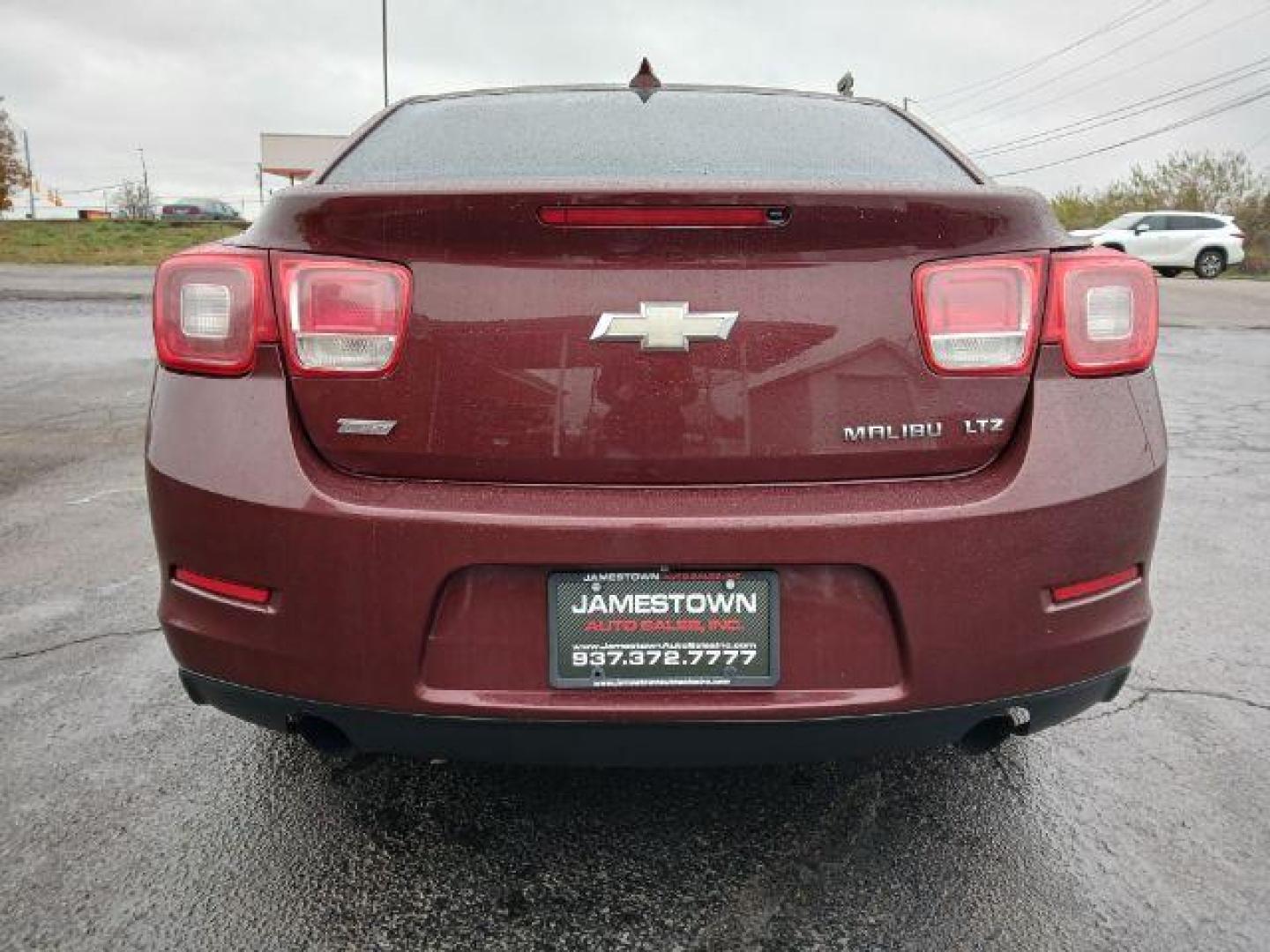 2015 Butte Red Metallic Chevrolet Malibu 2LTZ (1G11G5SX2FF) with an 2.0L L4 DOHC 16V engine, 6-Speed Automatic transmission, located at 1865 W 2nd St., Xenia, OH, 45385, (937) 372-7777, 39.681259, -83.961945 - Photo#5