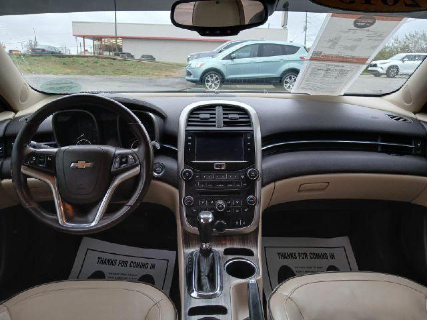 2015 Butte Red Metallic Chevrolet Malibu 2LTZ (1G11G5SX2FF) with an 2.0L L4 DOHC 16V engine, 6-Speed Automatic transmission, located at 1865 W 2nd St., Xenia, OH, 45385, (937) 372-7777, 39.681259, -83.961945 - Photo#7